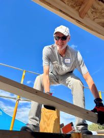 Jim doing roof work. Look at that blue sky!